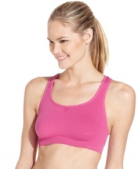 Energize your workout routine in Ideology's bright pink sports bra. Crisscross straps at the back lend comfort and support. Energize your workout routine in Ideology's bright pink sports bra. Crisscross straps at the back lend comfort and support.