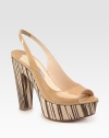 Patent leather slingback style with wooden heel and platform. Wooden heel, 5 (125mm)Wooden platform, 1 (25mm)Compares to a 4 heel (100mm)Patent leather upperLeather lining and solePadded insoleMade in Italy