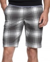 Standout on the course for both your swing and style in these performance plaid shorts from Puma.