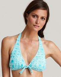 Bring an artsy look to the beach with Tommy Bahama's cube printed bikini, a graphic print in cool curacao blue--reversible to striking stripes. Bring an artsy look to the beach with Tommy Bahama's cube printed bikini, a graphic print in cool curacao blue--reversible to striking stripes.