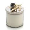 A nature-inspired design and subtle yet complex fragrance combine in this soy wax candle from Michael Aram.