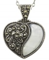 Embrace your hopeless romantic side with City by City's heart pendant necklace. With an intricate design and marcasite stones, there's a gorgeous mother-of-pearl accent at one side. Crafted in antiqued silver tone mixed metal, it's nickel-free for sensitive skin. Approximate length: 15 inches + 3-inch extender. Approximate drop: 1 inch.