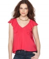 Ruffles make BCBGeneration's top more than a little sultry - pair with jeans and heels for a hot night out!