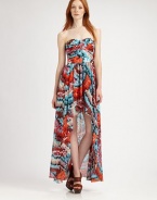 A colorful, feathery print and a leg-baring asymmetrical hemline add a unique twist to this flowing design.Strapless sweetheart necklineBanded waistAsymmetrical hemlineConcealed back zipFully linedAbout 35 from natural waistPolyesterDry cleanImportedModel shown is 5'10 (177cm) wearing US size 4. 