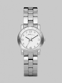 A classic style with a touch of sparkle and an iconic logo bezel. Quartz movementWater resistant to 3 ATMRound stainless steel case, 26mm (1) Logo bezelWhite dialCrystal and numeric hour markersSecond hand Stainless steel link braceletImported A classic style with a touch of sparkle and an iconic logo bezel. Quartz movementWater resistant to 3 ATMRound stainless steel case, 26mm (1) Logo bezelWhite dialCrystal and numeric hour markersSecond hand Stainless steel link braceletImported