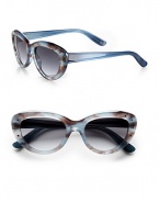A smaller version of the 1950's-inspired, cat's-eye-shaped, lightweight acetate frames for retro glamour. Available in blue with gray gradient lens or honey with brown gradient lens.Plastic temples100% UV protectionMade in Italy 