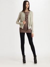 This soft knit design features allover gathers, extra-long sleeves, and a front zip closure.Jewel necklineAllover gathersFront zipBanded hemlineLong sleevesAbout 21 from shoulder to hem70% rayon/15% nylon/15% cottonDry cleanMade in Italy of imported fabricModel shown is 5'11 (180cm) wearing US size 4. This soft knit design features allover gathers, extra-long sleeves, and a front zip closure.Jewel necklineAllover gathersFront zipBanded hemlineLong sleevesAbout 21 from shoulder to hem70% rayon/15% nylon/15% cottonDry cleanMade in Italy of imported fabricModel shown is 5'11 (180cm) wearing US size 4.