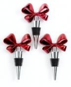 Topped with a bright red bow, Martha Stewart Collection's bottle stoppers are a stylish way to keep open bottles fresh.