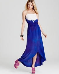 Imbued with a potent tie-dye print, this GUESS maxi dress makes an eclectically cool statement for summer. Imbued with a potent tie-dye print, this GUESS maxi dress makes an eclectically cool statement for summer.