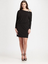 An enchanting design with an inspirational beaded shoulder strap and feminine ruching throughout the bodice for a flattering look. Round neckBeaded strapLong sleevesFully linedAbout 23 from natural waist95% polyester/5% spandexDry cleanMade in USA of imported fabric An enchanting design with an inspirational beaded shoulder strap and feminine ruching throughout the bodice for a flattering look. Round neckBeaded strapLong sleevesFully linedAbout 23 from natural waist95% polyester/5% spandexDry cleanMade in USA of imported fabric