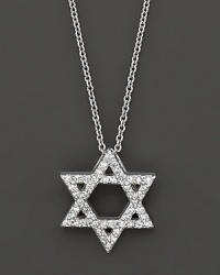 A diamond Star of David in a white gold setting. With a delicate white gold chain. A diamond Star of David in a white gold setting. With a delicate white gold chain.
