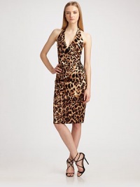 Demure, stretch-satin halter emboldened by a primal leopard print. Halter neckline Invisible back zipper Fully lined About 24 from shoulder to hem 57% viscose/40% cotton/3% Lycra Dry clean Made in USA of Italian fabric