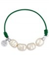 Majorica explores its whimsical side with this bracelet. Organic man-made pearls (8 mm) adorn a green elastic cord for a fun and fashionable look. Approximate length: 6-1/2 inches.