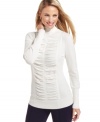This petite turtleneck sweater features a flattering fit and fabulous ruching at the front!