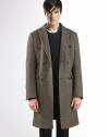 Basket weave, double-breasted overcoat with velvet detail under the collar.Front patch pocketsSingle back ventAbout 39.4 long84% wool/16% silkDry cleanMade in Italy