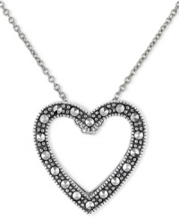 Romantic accent. You'll simply adore Genevieve & Grace's pretty open-cut heart pendant with its glittering marcasite surface. Set in sterling silver. Approximate length: 18 inches. Approximate drop: 1 inch. Romantic accent. You'll simply adore Genevieve & Grace's pretty open-cut heart pendant with its glittering marcasite surface. Set in sterling silver. Approximate length: 18 inches. Approximate drop: 1 inch.