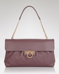 Channel this season's feminine mood with this ladylike shoulder bag from Salvatore Ferragamo. It's frame shape and gold-tone hardware makes the most sophisticated impression. Channel this season's feminine mood with this ladylike shoulder bag from Salvatore Ferragamo. It's frame shape and gold-tone hardware makes the most sophisticated impression.
