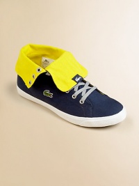 Eternally cool, sturdy canvas lace-ups with contrasting fold-over high-top in a vibrant hue with signature embroidered croc for top of the line style.Lace-upCotton canvas upperRubber solePadded insoleImported Eternally cool, sturdy canvas lace-ups with contrasting fold-over high-top in a vibrant hue with signature embroidered croc for top of the line style.Lace-upCotton canvas upperRubber solePadded insoleImported