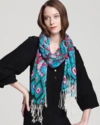 Blooming with blurred florals offset by crisp ikat print, this fringed Lilly Pulitzer scarf infuses your everyday look with a vibrant breeze of bohemia. Blooming with blurred florals offset by crisp ikat print, this fringed Lilly Pulitzer scarf infuses your everyday look with a vibrant breeze of bohemia.