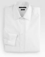 Clean and classic in smooth cotton with a slightly fitted shape. Buttonfront Moderate spread collar Cotton Dry clean Made in Italy 