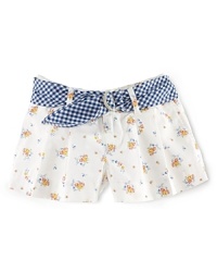 Pressed pleats, colorful florals and a preppy gingham belt give this warm-weather staple a decidedly darling update. Pressed pleats, colorful florals and a preppy gingham belt give this warm-weather staple a decidedly darling update.