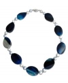 Multifaceted blue agate beads (32 mm) are separated with delicate cultured freshwater pearls (8 mm) in this brilliantly colored necklace to create a statement piece that truly captures the eye. Necklace set in sterling silver. Approximate length: 18 inches.