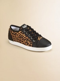 Classic lace-up sneakers with leather trim in a leopard print.Lace-up65% polyester/31% leather/4% spandex upper95% polyester/5% leather liningRubber solePadded insoleImported Classic lace-up sneakers with leather trim in a leopard print.Lace-up65% polyester/31% leather/4% spandex upper95% polyester/5% leather liningRubber solePadded insoleImported