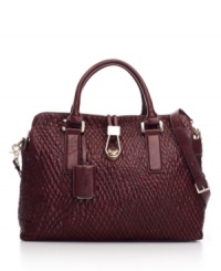 Contoured diamond quilting on a glazed surface brings light-catching depth to this creatively chic satchel from Ivanka Trump. Contoured diamond quilting on a glazed surface brings light-catching depth to this creatively chic satchel from Ivanka Trump.