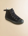 Classic Chuck Taylors in ultra-soft suede with cozy, faux shearling lining in a must-have high-top silhouette.Lace-up closureLeather upperFaux shearling liningRubber solePadded insoleImported