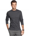 Simple and clean, this long-sleeved shirt from Calvin Klein is your best basic for summer nights.
