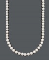 Elevate your look with elegance in longer lengths. This strand of pearls by Belle de Mer features AA+ cultured freshwater pearls with a 14k gold clasp. Approximate length: 30 inches.