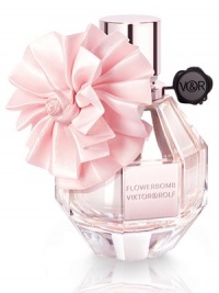 Flowerbomb is a floral explosion, a profusion of flowers that has the power to make everything more positive. Flowerbomb dresses up in a whimsical pink pleated flower inspired by Viktor & Rolf couture. A gorgeous plasma effect reflects from the inside out giving Flowerbomb a sensational dimension to celebrate the holiday season. 1.7 oz. Flowerbomb is a floral explosion, a profusion of flowers that has the power to make everything more positive. Flowerbomb dresses up in a whimsical pink pleated flower inspired by Viktor & Rolf couture. A gorgeous plasma effect reflects from the inside out giving Flowerbomb a sensational dimension to celebrate the holiday season. 1.7 oz.