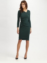Asymmetrical draping, ruching and a crossover v-neck enhance this sultry, fitted jersey dress. Crossover v-neckLong sleevesAsymmetrical front hemAbout 25 from natural waist73% modal/18% wool/9% elastaneDry cleanImportedModel shown is 5'10 (177cm) wearing US size 4. Asymmetrical draping, ruching and a crossover v-neck enhance this sultry, fitted jersey dress. Crossover v-neckLong sleevesAsymmetrical front hemAbout 25 from natural waist73% modal/18% wool/9% elastaneDry cleanImportedModel shown is 5'10 (177cm) wearing US size 4.
