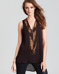 Copper beads illuminate this Aqua Luxe sheer blouse for a gorgeous look you can easily work through the day with jeans or at cocktails with tuxedo pants. Copper beads illuminate this Aqua Luxe sheer blouse for a gorgeous look you can easily work through the day with jeans or at cocktails with tuxedo pants.