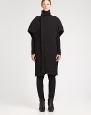 Sculptural and modern, finished with unique cape sleeves and side slash pockets.Funnel collarShort cape sleevesAsymmetrical concealed button frontSide slash pocketsAbout 42 from shoulder to hem97% cotton/3% spandexDry cleanMade in Italy of imported fabricModel shown is 5'10½ (179cm) wearing US size Small. 