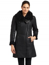 THE LOOKFur collarAsymmetric zip frontDual zip pocketsLined cuffsTHE FITAbout 32 from shoulder to hemTHE MATERIALBody: dyed shearlingTrim: leatherFur: natural lamb furFully linedCARE & ORIGINDry clean by fur specialistFur origin: ItalyImportedModel shown is 5'10 (177cm) wearing US size Small. THE LOOKFur collarAsymmetric zip frontDual zip pocketsLined cuffsTHE FITAbout 32 from shoulder to hemTHE MATERIALBody: dyed shearlingTrim: leatherFur: natural lamb furFully linedCARE & ORIGINDry clean by fur specialistFur origin: ItalyImportedModel shown is 5'10 (177cm) wearing US size Small.