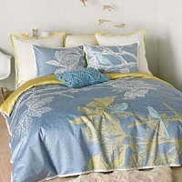 Etched motifs of blue birds resting on branches seem to float above a mosaic pattern in slate blue on our Icelandic Dream collection. Duvet is accented with, and reverses to, hemp yellow and finished with an ivory tailored flange. Set includes duvet cover. Etched motifs of blue birds resting on branches seem to float above a mosaic pattern in slate blue on our Icelandic Dream collection. Duvet is accented with, and reverses to, hemp yellow and finished with an ivory tailored flange. Set includes duvet cover.