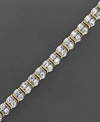 Light up your everyday ensemble with this tremendously elegant diamond bracelet. Featuring round-cut diamonds (2 ct. t.w.) set in 14k gold. 2 carat diamond bracelet measures approximately 7-1/4 inches long.
