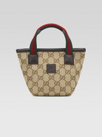 Timeless GG fabric with signature web handles and leather trim.Double signature web top handles, about 2½ dropAbout 7¾L X 4W X 5½HGG fabric and leather trimMade in Italy Timeless GG fabric with signature web handles and leather trim.Double signature web top handles, about 2½ dropAbout 7¾L X 4W X 5½HGG fabric and leather trimMade in Italy