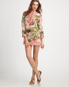A vibrant coverup offering the best of both worlds: pretty prints and a relaxed-yet-flattering fit.Round neckThree-quarter sleevesButton placketContrast trimPull-on style72% cotton/28% silkDry cleanMade in USA of Italian fabric