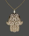 Diamond Hamsa pendant necklace in yellow gold.