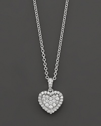 A lovely pendant with pave-set diamonds in 14 Kt. white gold. A lovely pendant with pave-set diamonds in 14 Kt. white gold.