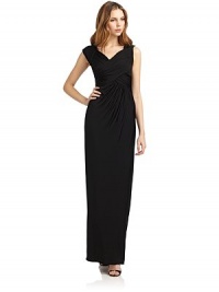 Sensuous jersey crisscrosses along the front bodice for a simple yet sophisticated style.V neckline Crisscross front Side zipper Ruched back waistband About 50 from shoulder to hem 95% rayon/5% other fibers Dry clean Made in Italy Sensuous jersey crisscrosses along the front bodice for a simple yet sophisticated style.V neckline Crisscross front Side zipper Ruched back waistband About 50 from shoulder to hem 95% rayon/5% other fibers Dry clean Made in Italy