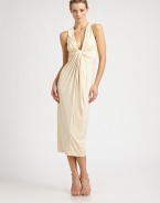 Artful gathers and a sexy twist-front detail define this soft, pullover style.Plunging V necklineSleevelessTwist-front detailV back with concealed zipSlight racerbackAbout 33 from natural waist92% polyester/8% spandexDry cleanImportedModel shown is 5'11 (180cm) wearing US size 4. 