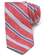 A fine blend of soft linen and plush silk harmonize together on this handsome tie, featuring a refreshing light stripe design that pairs perfectly with your warm weather suiting.