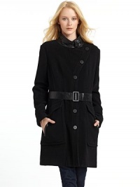 THE LOOKLeather stand collar with dual button closureLeather shoulder epaulettesWool blend constructionButton front with concealed zipperLong sleeves with topstitched cuffsRemovable buckled leather beltDual button flap pocketsTHE FITAbout 36 from shoulder to hemTHE MATERIALShell: 80% wool/20% polyamideTrim: leatherFully linedCARE & ORIGINDry cleanImported THE LOOKLeather stand collar with dual button closureLeather shoulder epaulettesWool blend constructionButton front with concealed zipperLong sleeves with topstitched cuffsRemovable buckled leather beltDual button flap pocketsTHE FITAbout 36 from shoulder to hemTHE MATERIALShell: 80% wool/20% polyamideTrim: leatherFully linedCARE & ORIGINDry cleanImported