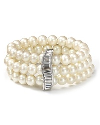 Vow to wow on your big day with this triple strand pearl bracelet. With a striking silver baguette, it's a statement piece for the bride-to-be with classic aisle style. Vow to wow on your big day with this triple strand pearl bracelet. With a striking silver baguette, it's a statement piece for the bride-to-be with classic aisle style.