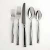 This set includes 12 each: dinner fork, dinner spoon, salad fork, teaspoon and dinner knife plus one each sugar shell, butter knife, serving spoon, slotted spoon and cold meat fork.