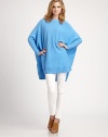 Refined wool-rich sweater in a poncho silhouette with long dolman sleeves and a touch of cashmere. BoatneckLong dolman sleevesPullover styleRibbed asymmetrical hemAbout 33 from shoulder to hemWool/viscose/polyamide/cashmere/angoraDry cleanImportedModel shown is 5'10 (177cm) wearing US size XSmall / Small. 