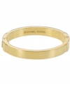 The final touches. Polish your overall look with Michael Kors shiny bangle bracelet. Crafted in gold tone mixed metal with a hinge clasp for effortless wear. Approximate diameter: 2-1/2 inches.